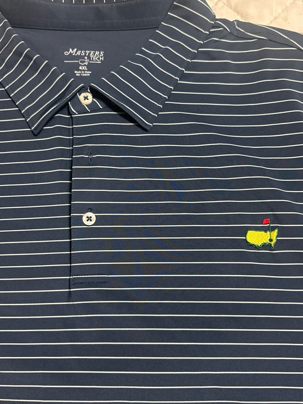 Masters Navy Polo with White Pinstripes and Yellow Emblem